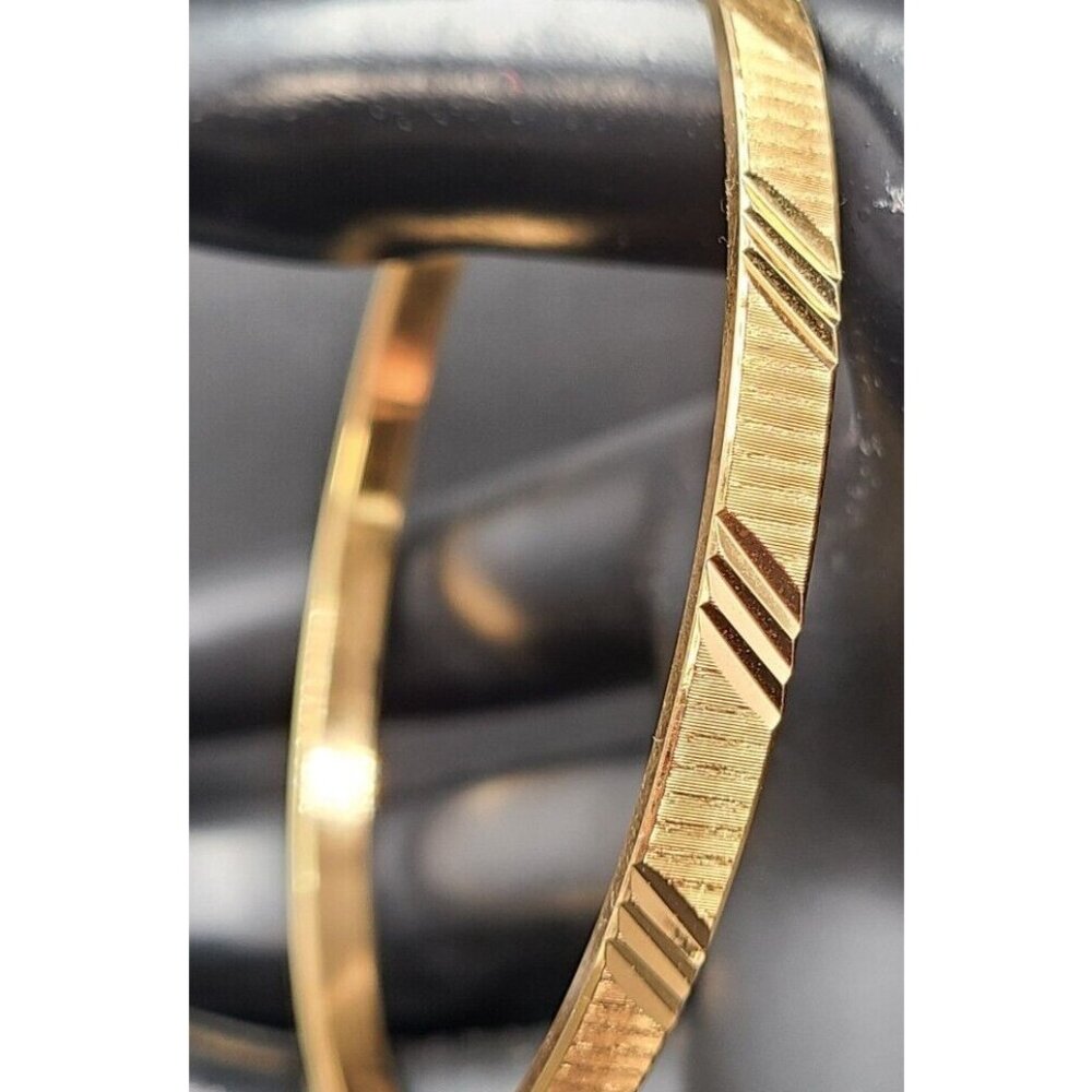 Monet Gold Tone Bangle Bracelet Etched Design Signed